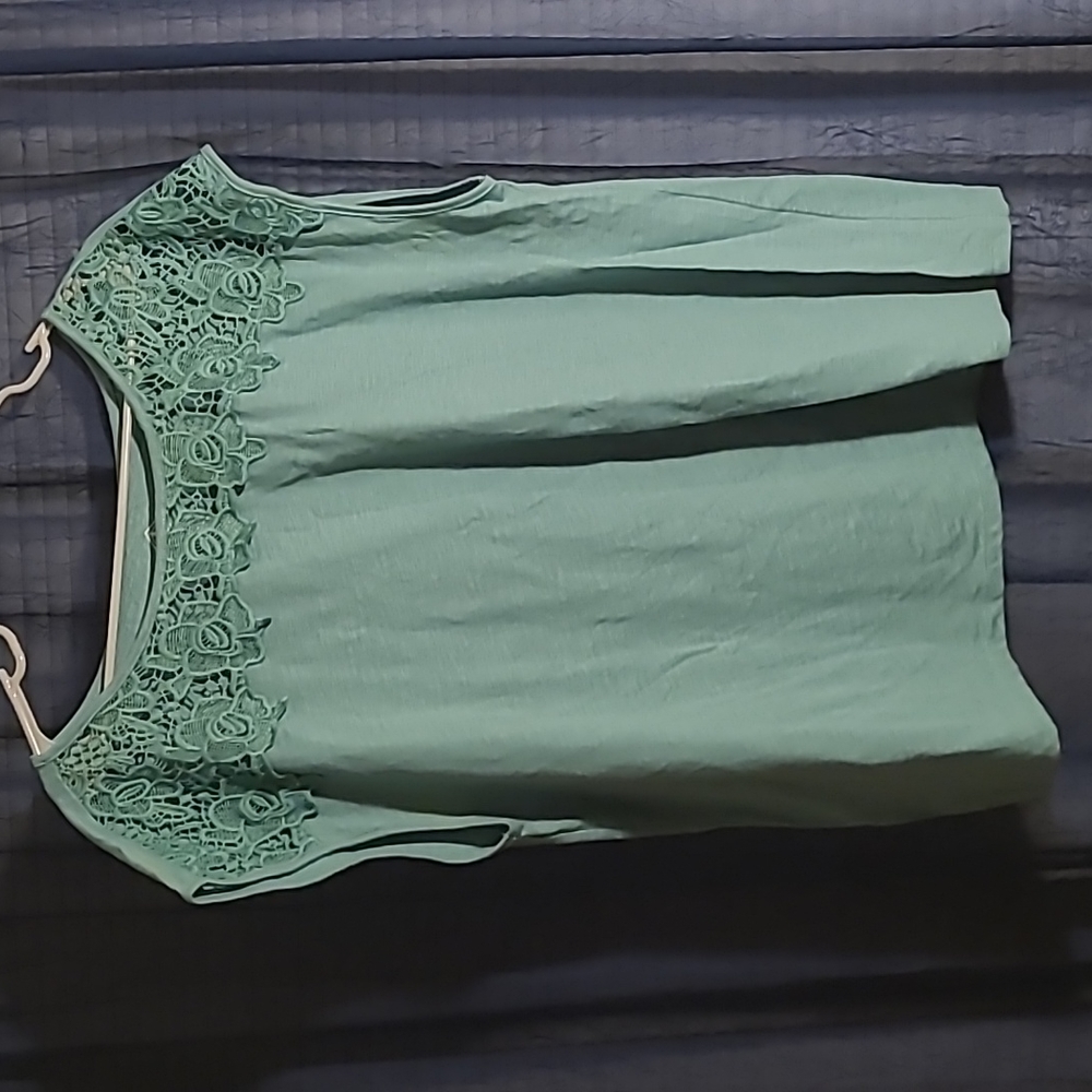 Women's teal cotton shirt with braided neckline